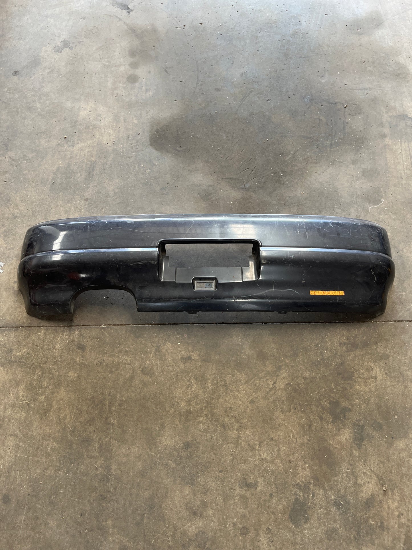 Standard Nissan R33 Skyline Plastic Rear Bar (Missing Mount On One Side)